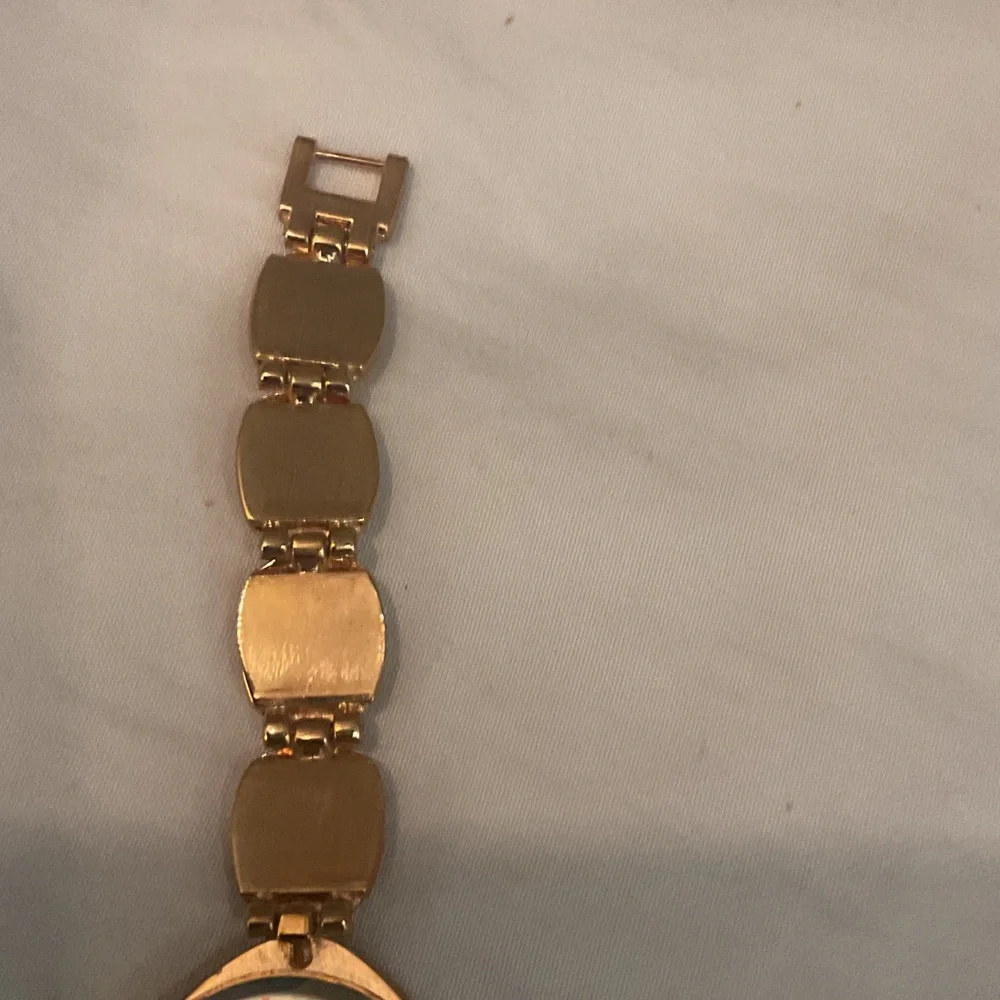 Elegant Gold and Black Women's Watch